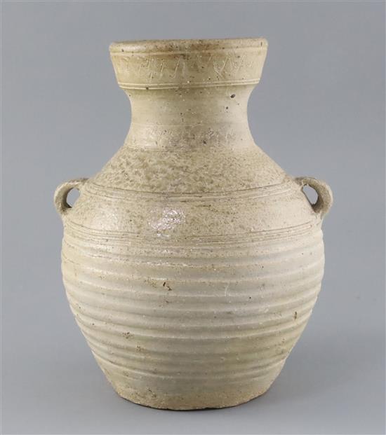 A Chinese pale green glazed jar, Han dynasty, H. 24.5cm